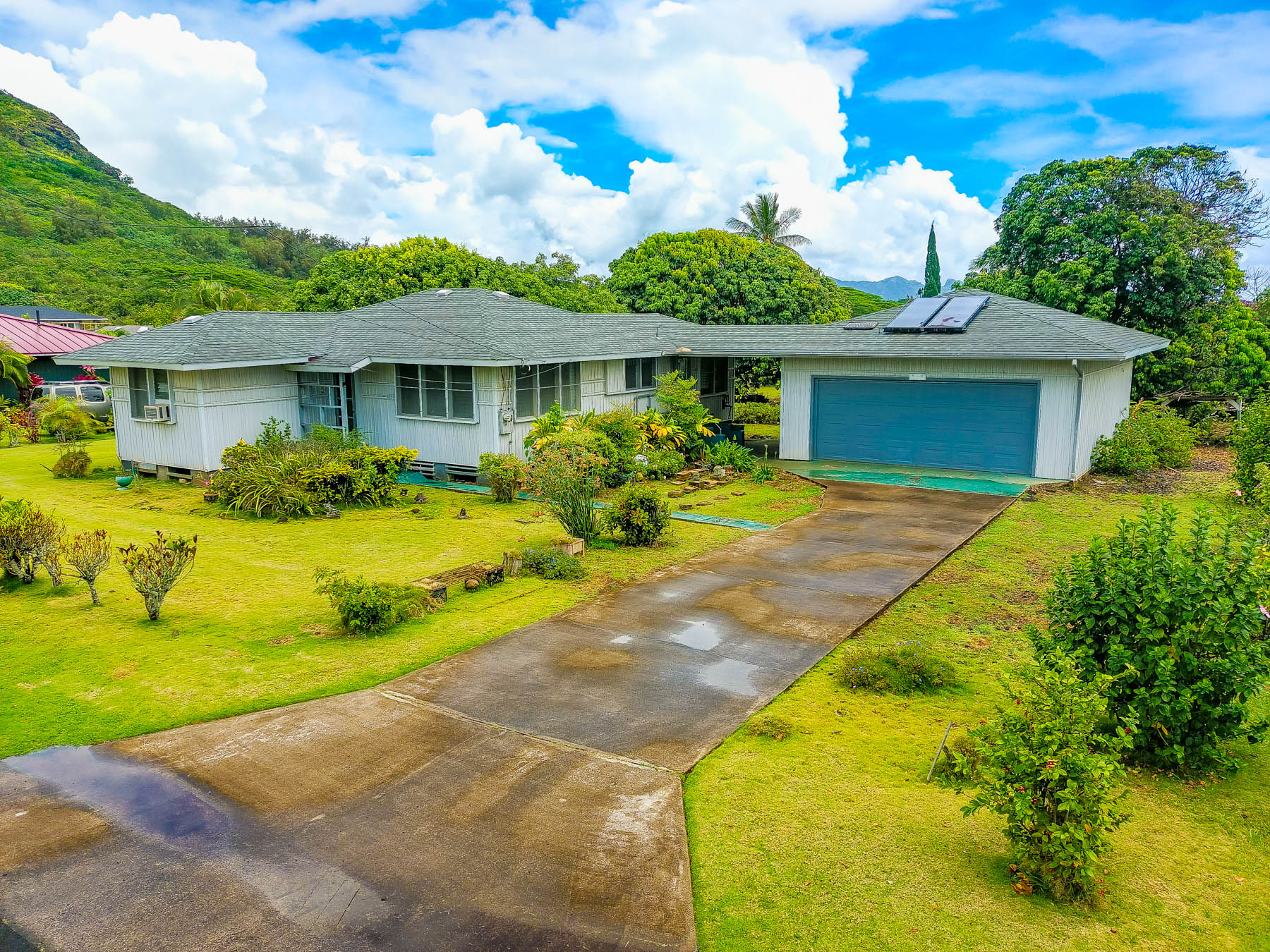 5116 Kula Road Kapaa, HI 96746 - Photo 5 of 28 a front view of house with yard and green space