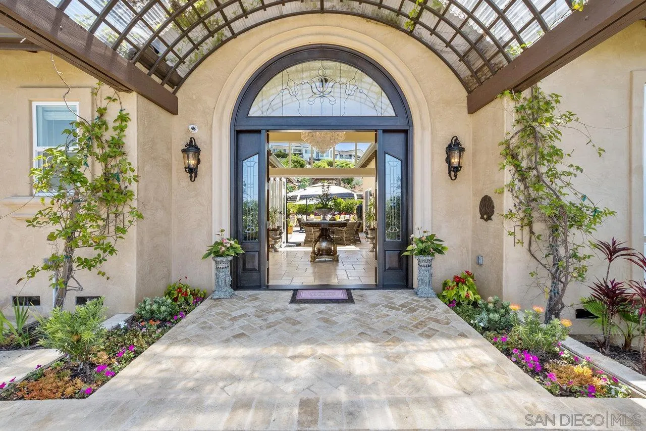 7342 Altiva Place Carlsbad, CA 92009 - Photo 3 of 56 a view of entrance door of the house