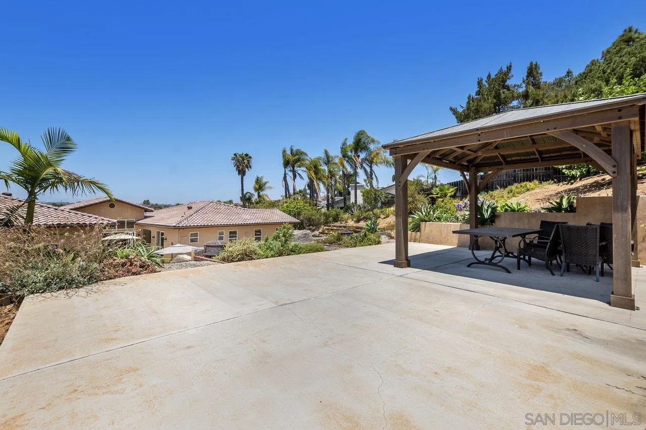 7342 Altiva Place Carlsbad, CA 92009 - Photo 48 of 56 a view of outdoor space with porch and furniture