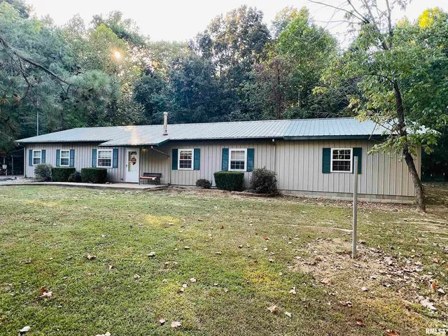 a house view with a garden space
