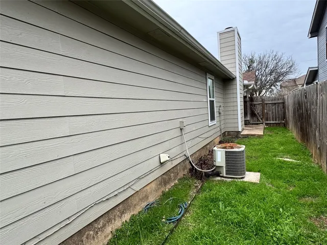 a backyard of a house with seating space