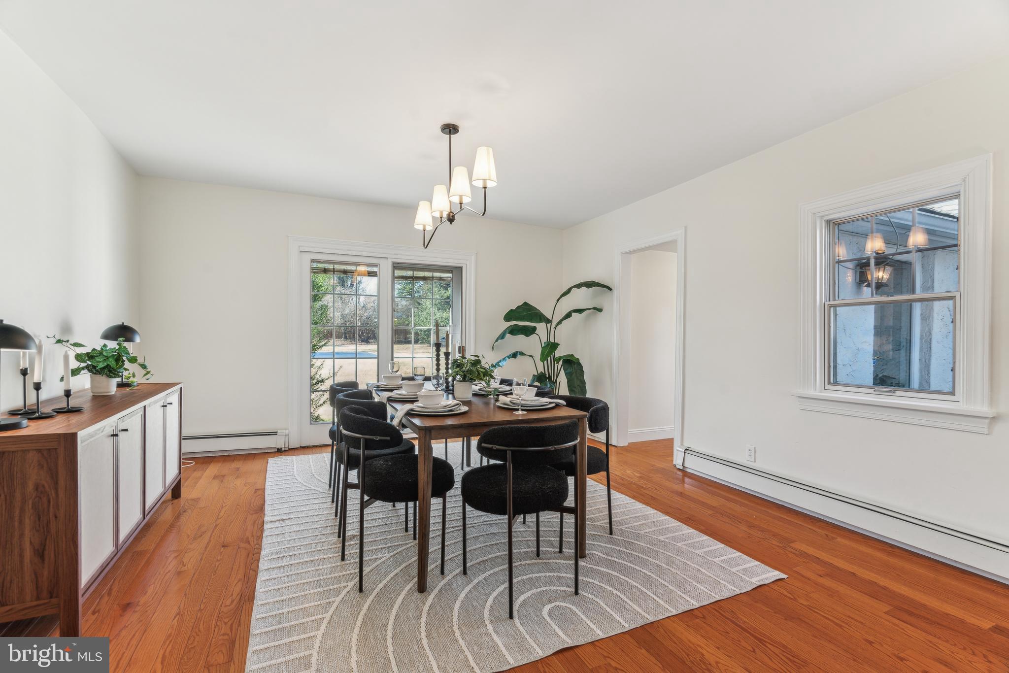 436 Penn Valley Road Penn Valley, PA 19072 - Photo 16 of 64 a view of a dining room with furniture window and wooden floor