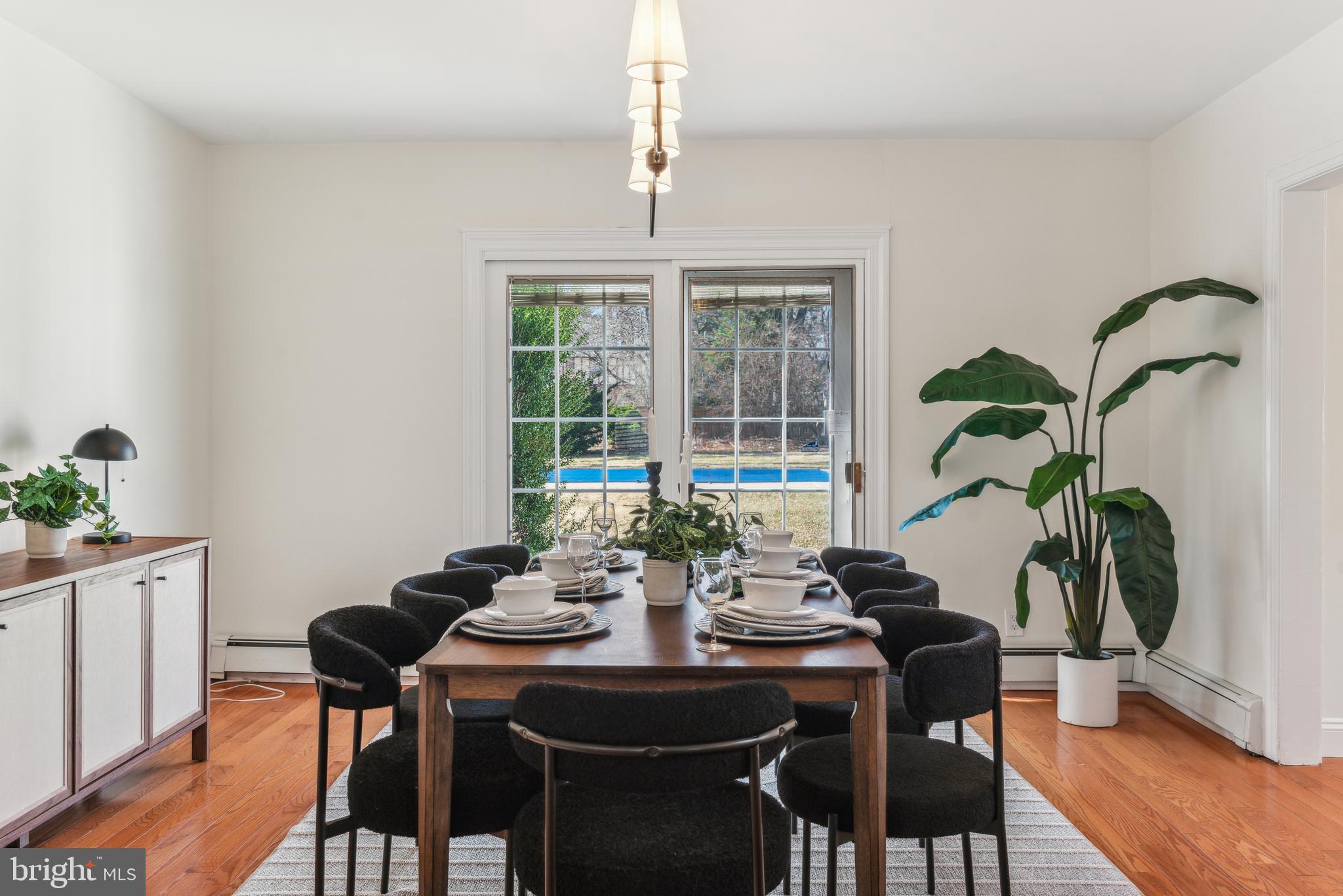 436 Penn Valley Road Penn Valley, PA 19072 - Photo 17 of 64 a view of a dining room with furniture window and wooden floor