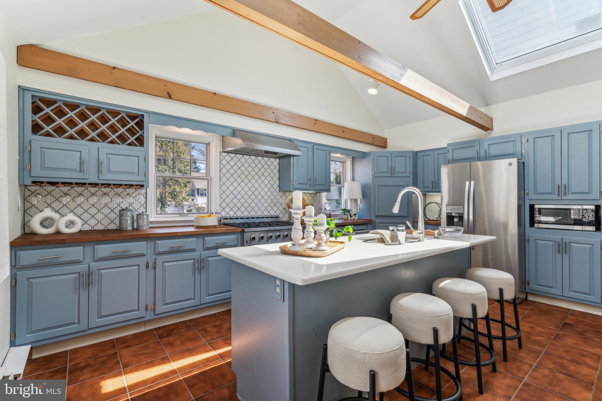 436 Penn Valley Road Penn Valley, PA 19072 - Photo 23 of 64 a kitchen with stainless steel appliances granite countertop a sink and a refrigerator