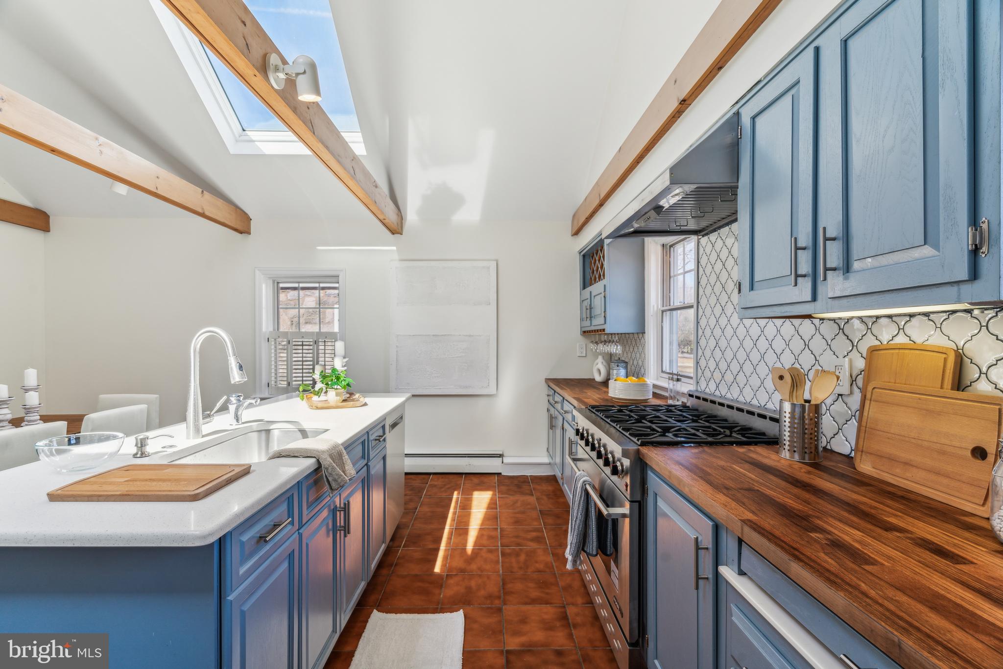 436 Penn Valley Road Penn Valley, PA 19072 - Photo 24 of 64 a kitchen with stainless steel appliances granite countertop a stove and a sink