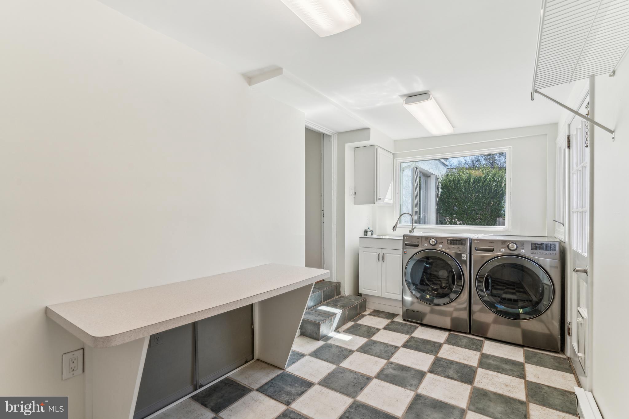 436 Penn Valley Road Penn Valley, PA 19072 - Photo 29 of 64 a view of a storage and utility room with a washer dryer