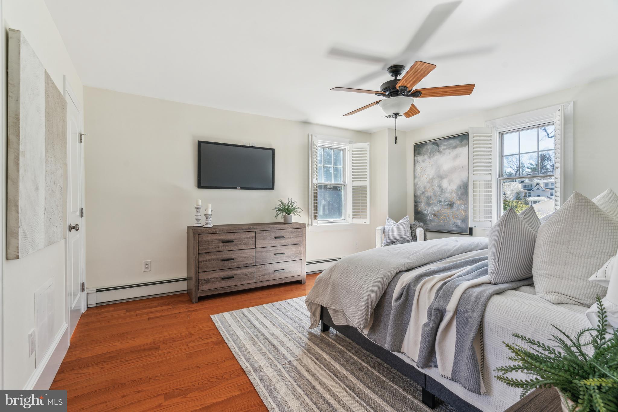 436 Penn Valley Road Penn Valley, PA 19072 - Photo 34 of 64 a bedroom with a bed and flat screen tv