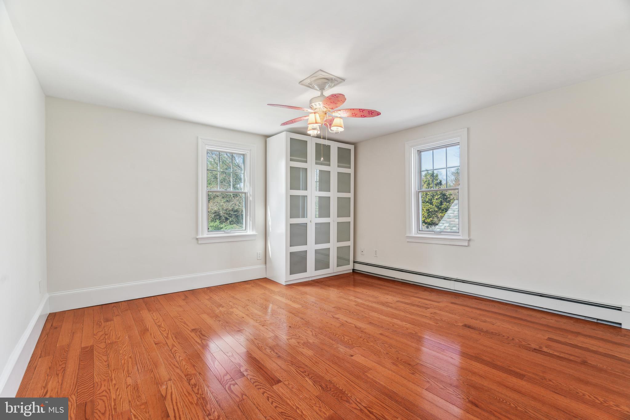 436 Penn Valley Road Penn Valley, PA 19072 - Photo 40 of 64 wooden floor in an empty room with a window
