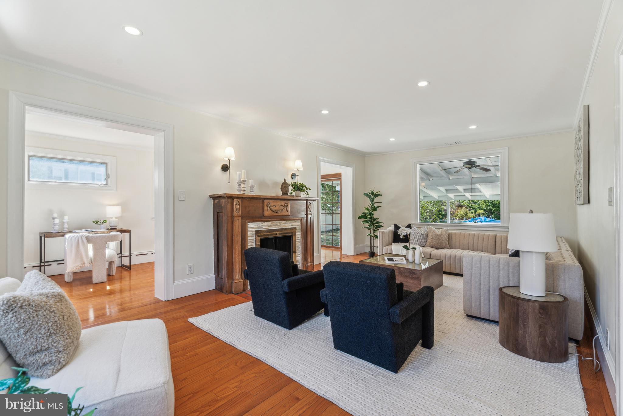 436 Penn Valley Road Penn Valley, PA 19072 - Photo 4 of 64 a living room with furniture and a fireplace