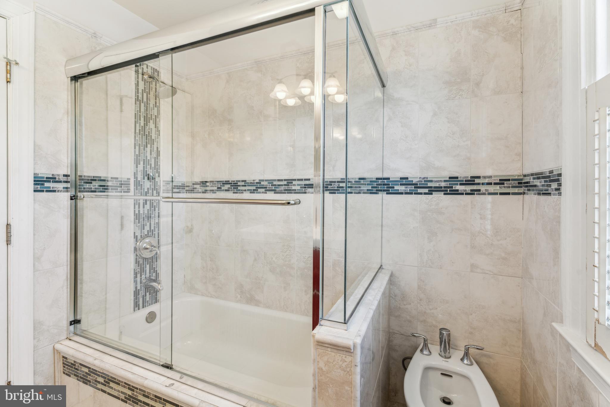 436 Penn Valley Road Penn Valley, PA 19072 - Photo 45 of 64 a bathroom with a shower and a glass door