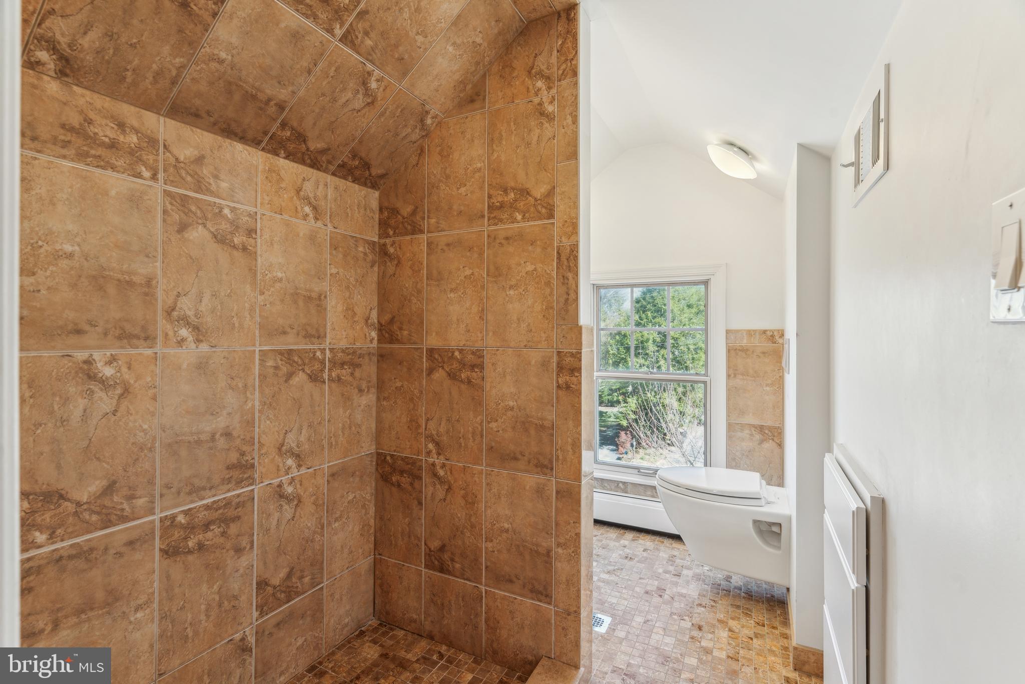 436 Penn Valley Road Penn Valley, PA 19072 - Photo 51 of 64 a bathroom with a shower and a toilet