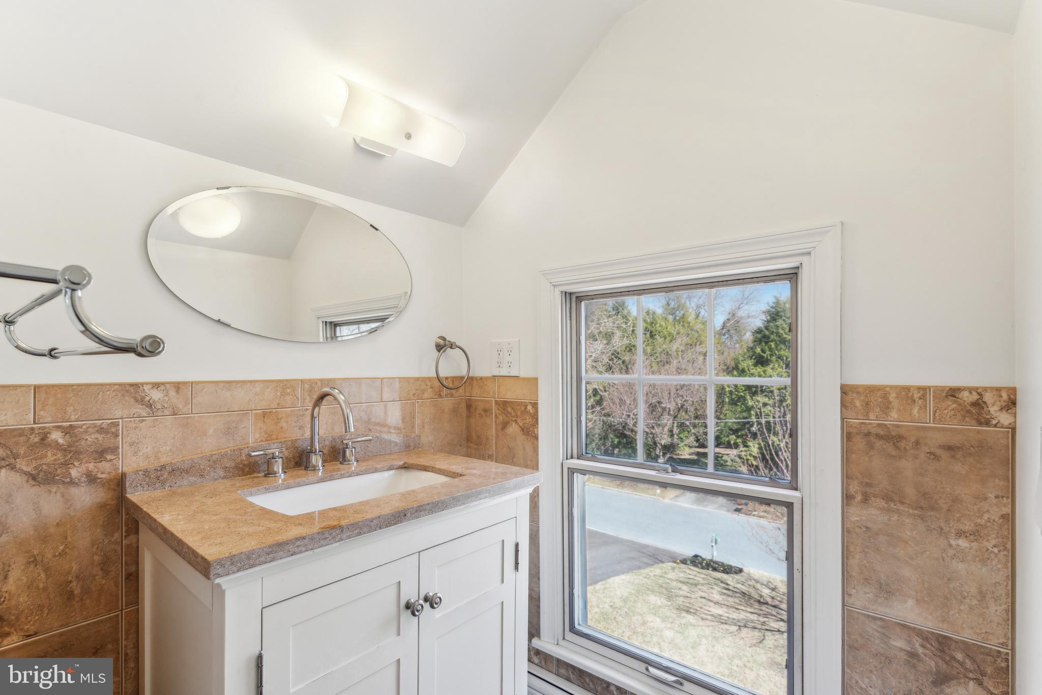 436 Penn Valley Road Penn Valley, PA 19072 - Photo 53 of 64 a bathroom with a sink and a mirror
