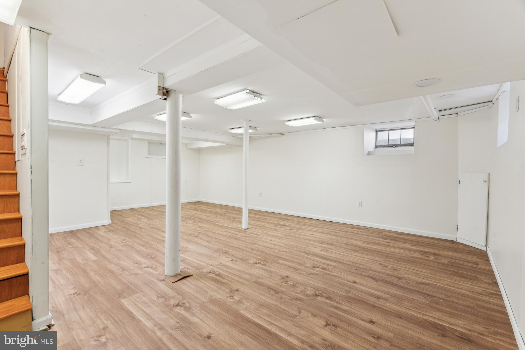 436 Penn Valley Road Penn Valley, PA 19072 - Photo 54 of 64 a view of an empty room with wooden floor