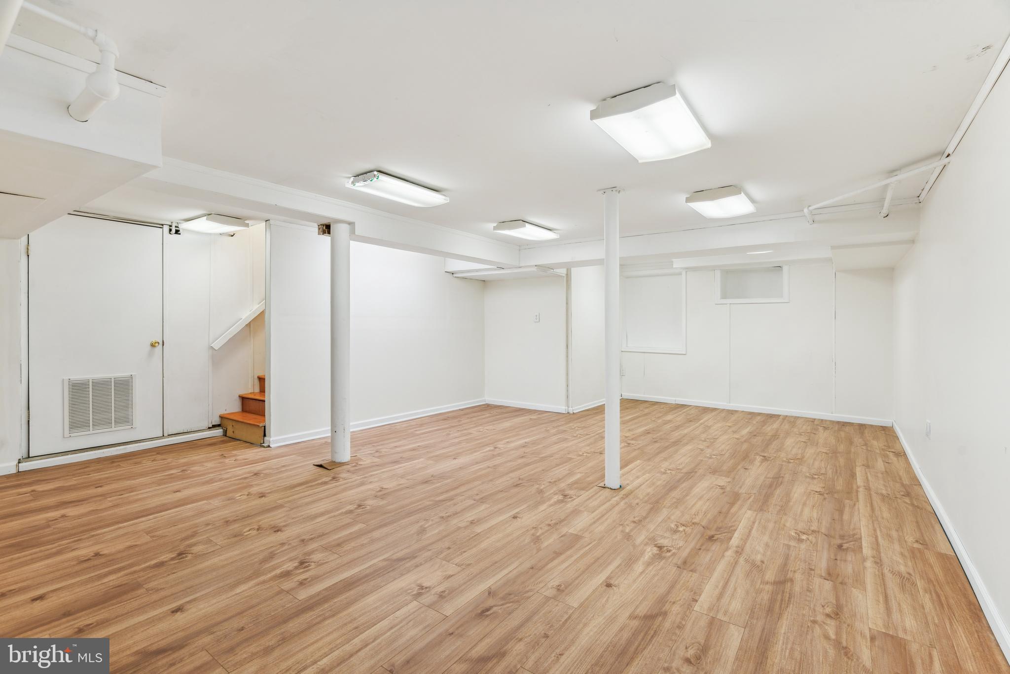 436 Penn Valley Road Penn Valley, PA 19072 - Photo 55 of 64 a view of empty room with wooden floor and fan