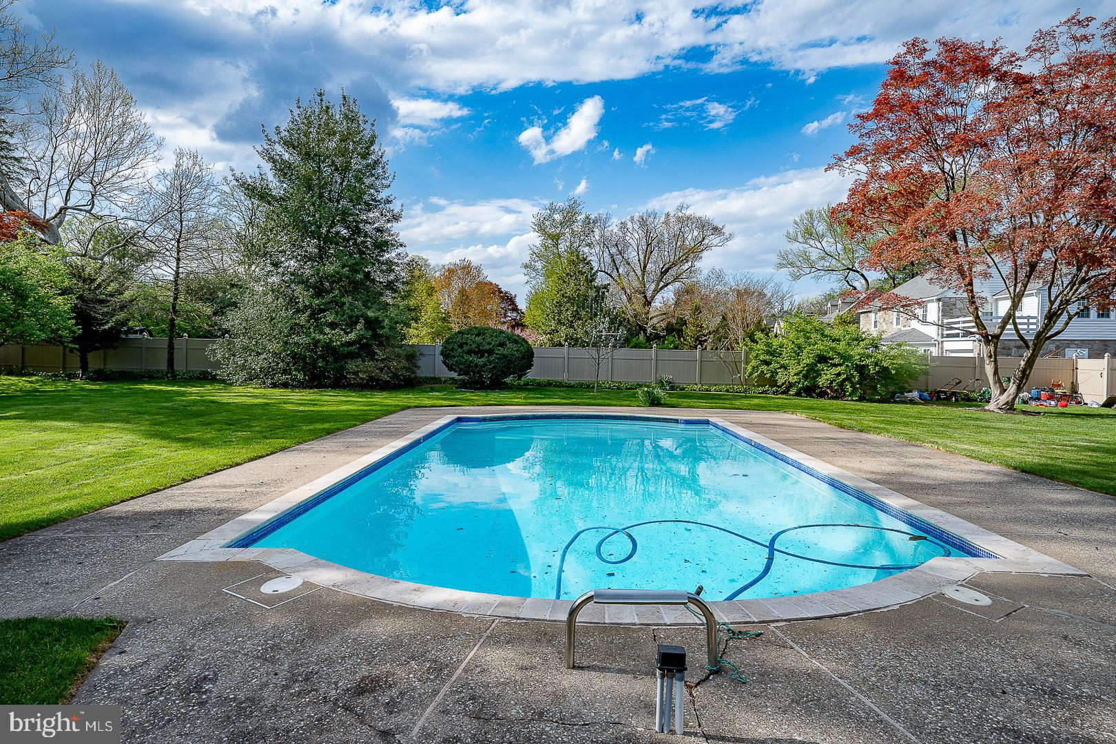 436 Penn Valley Road Penn Valley, PA 19072 - Photo 61 of 64 a view of a swimming pool with a yard and potted plants