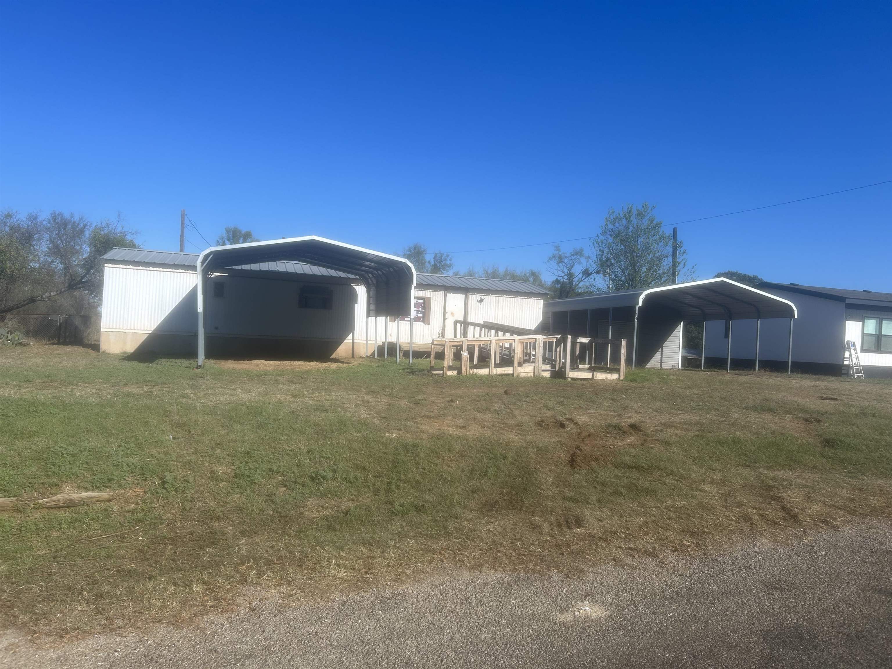 a front view of house with yard and seating