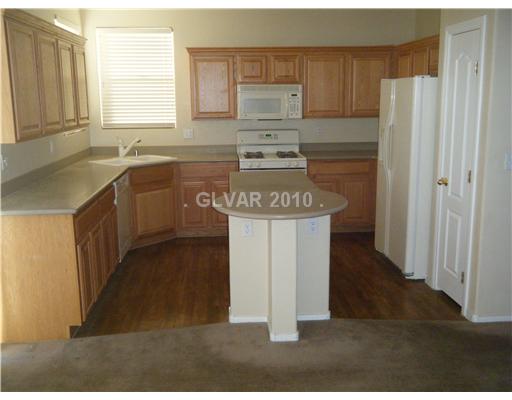8926 Rutherford Grove Street Las Vegas, NV 89148 - Photo 2 of 11 Kitchen.