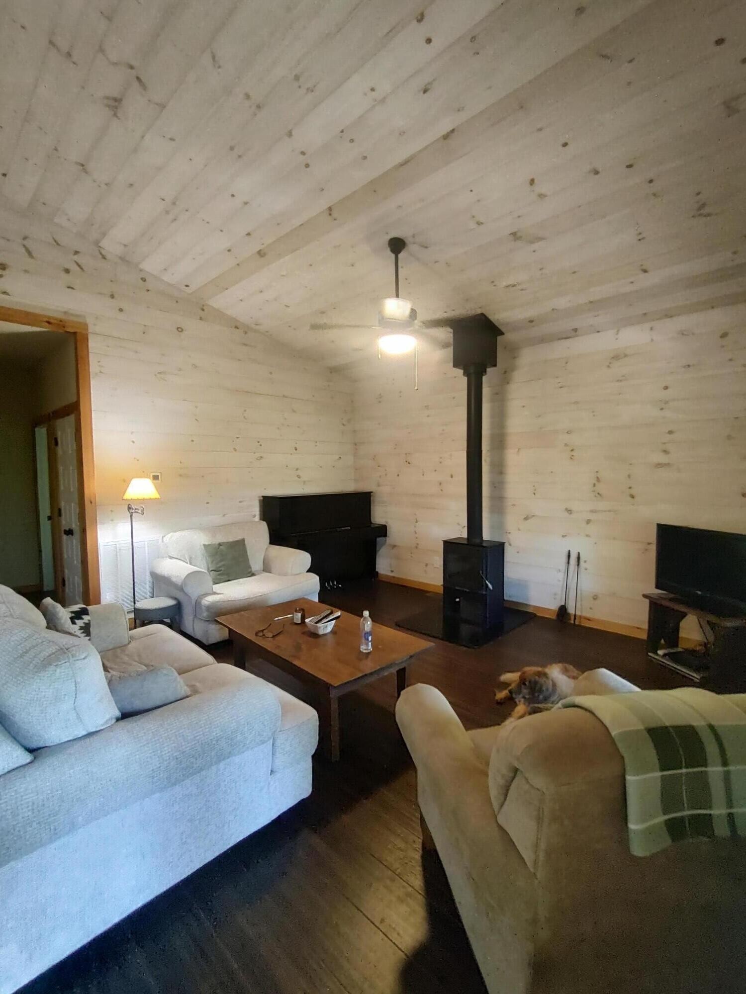 121 Polly Wally Road Ocoee, TN 37361 - Photo 13 of 29 a bedroom with furniture and a fireplace