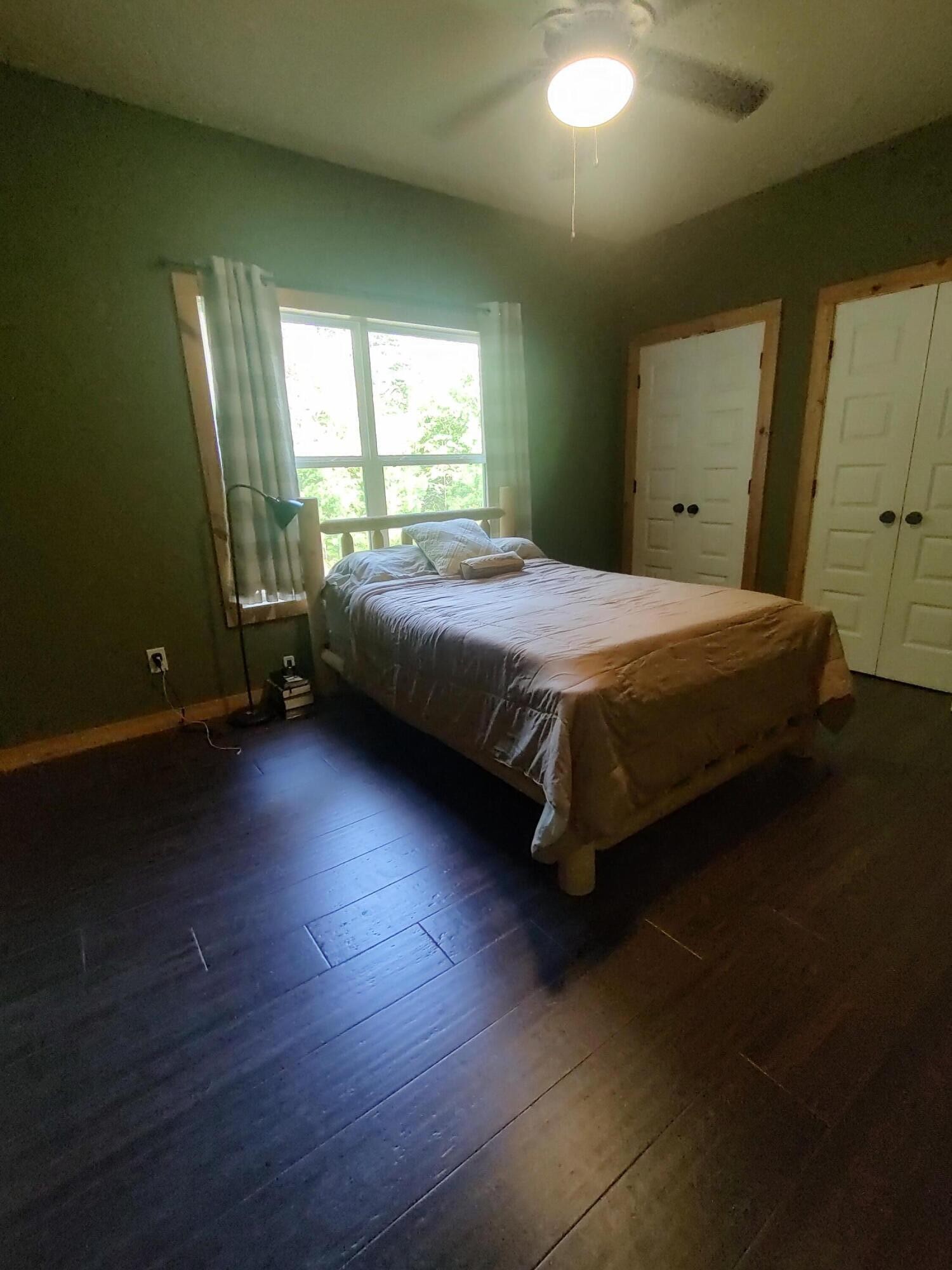 121 Polly Wally Road Ocoee, TN 37361 - Photo 17 of 29 a bedroom with a bed and window