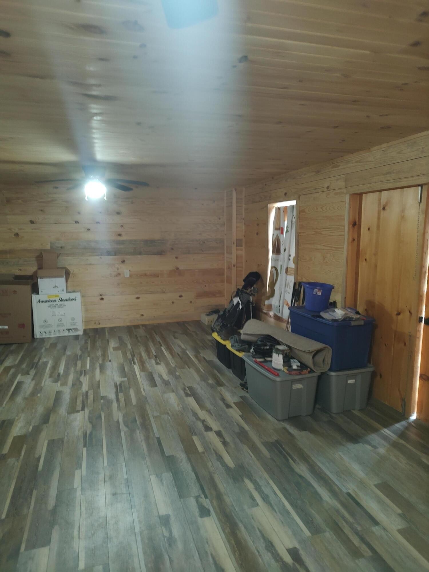 121 Polly Wally Road Ocoee, TN 37361 - Photo 25 of 29 a room with wooden floor and furniture