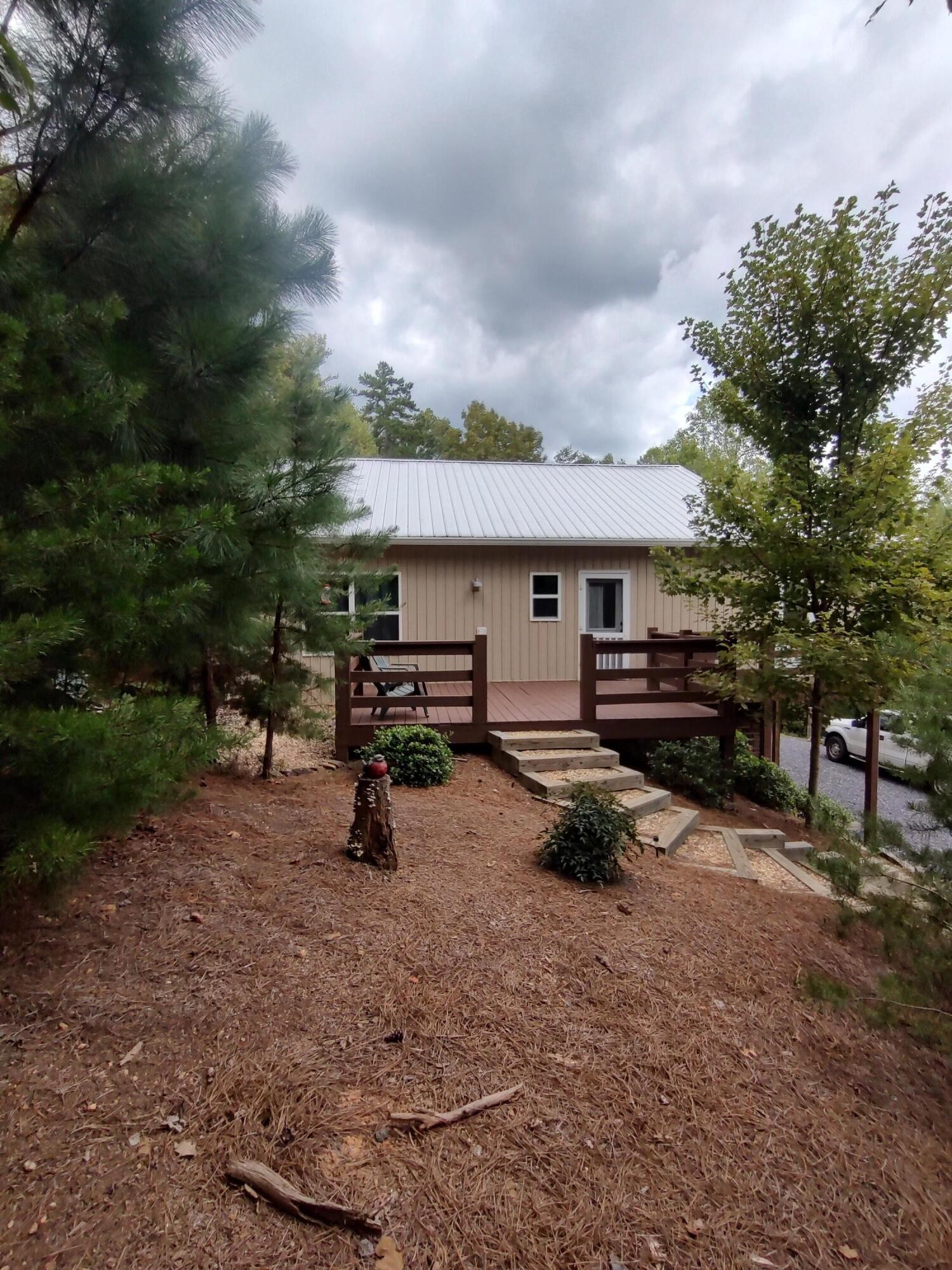121 Polly Wally Road Ocoee, TN 37361 - Photo 5 of 29 a view of a house with a yard