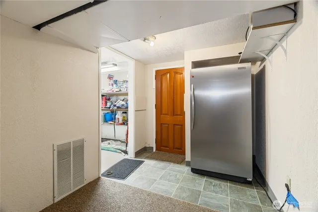 a view of storage and utility room