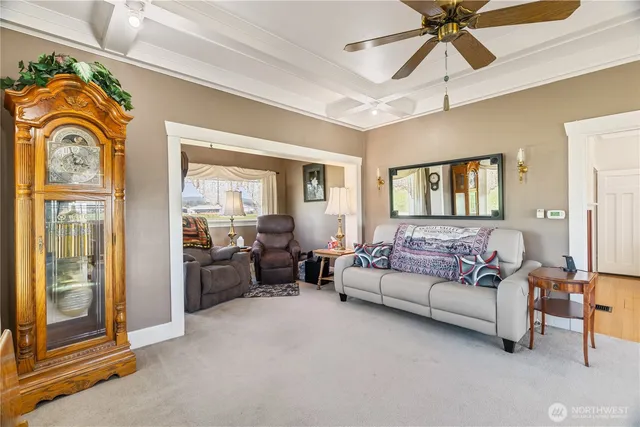 a living room with furniture and a window