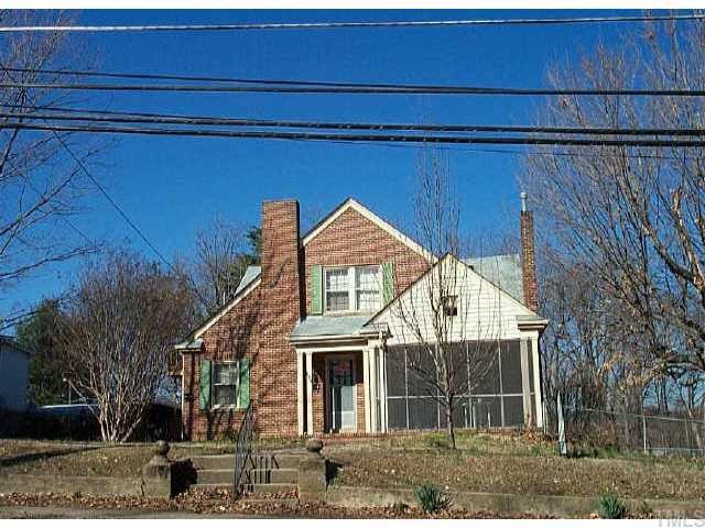 407 South Main Street Roxboro, NC 27573 - Photo 1 of 1 a front view of a house with garden