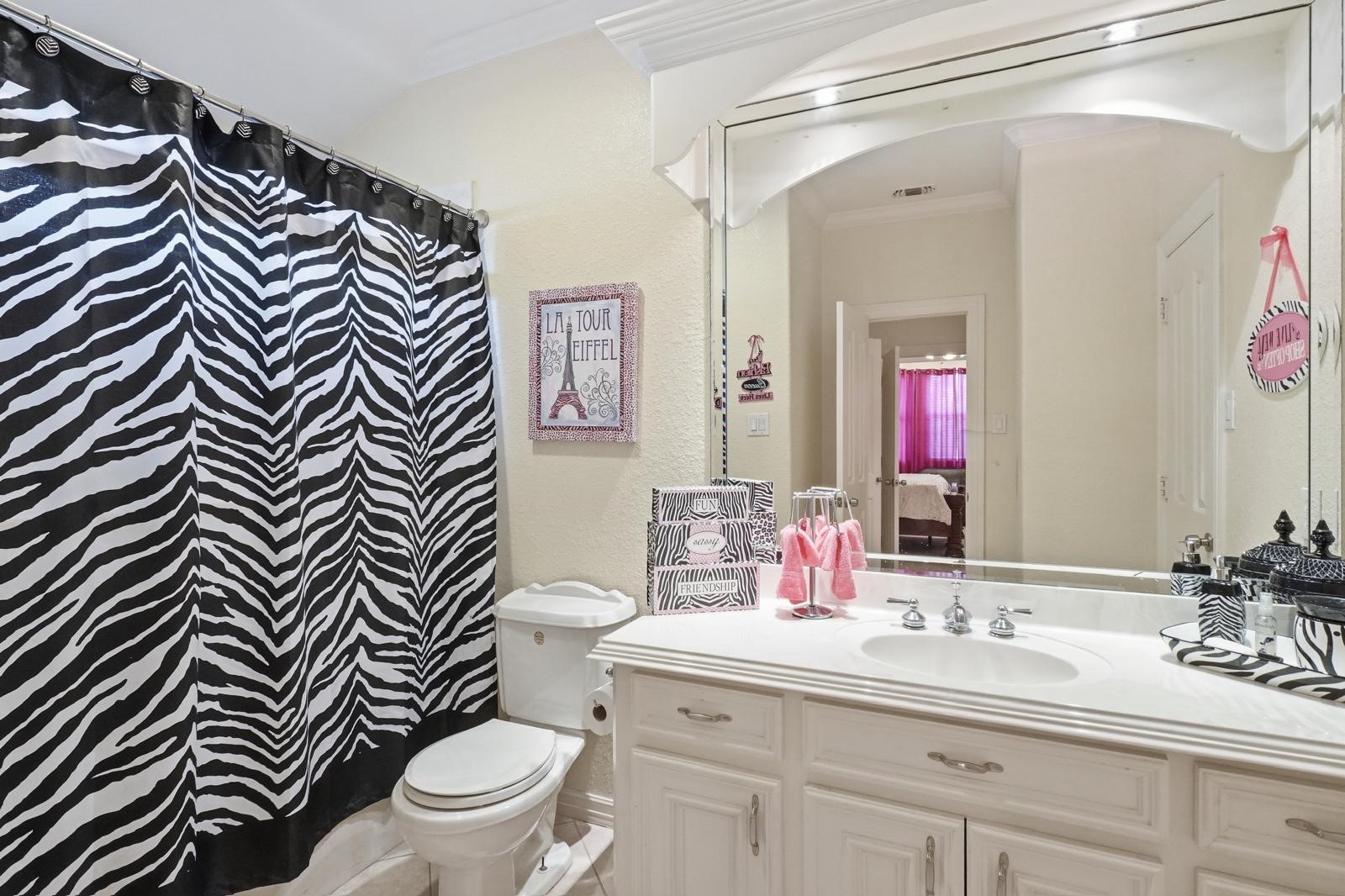 247 Old Spring Lane Houston, TX 77015 - Photo 17 of 25 a bathroom with a sink mirror and toilet