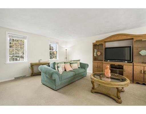 48 Rainbow Drive Haverhill, MA 01835 - Photo 12 of 33 a living room with furniture and a flat screen tv