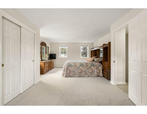 48 Rainbow Drive Haverhill, MA 01835 - Photo 15 of 33 a bedroom with furniture and flat screen tv