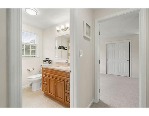 48 Rainbow Drive Haverhill, MA 01835 - Photo 24 of 33 a bathroom with a toilet sink a mirror and a shower