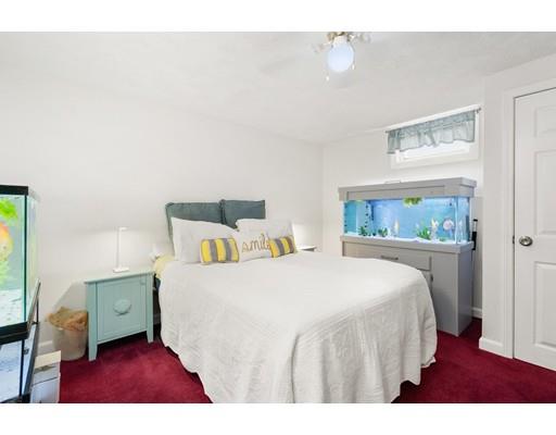 48 Rainbow Drive Haverhill, MA 01835 - Photo 30 of 33 a bedroom with a bed and a window