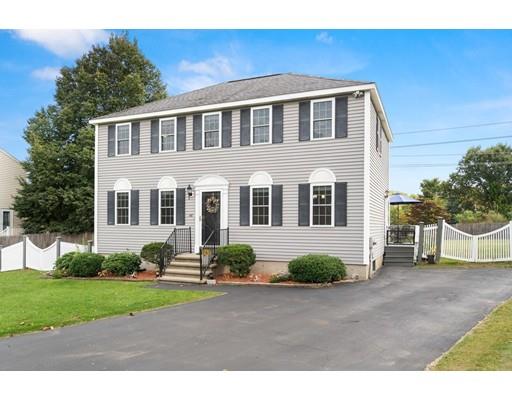 48 Rainbow Drive Haverhill, MA 01835 - Photo 3 of 33 a front view of a house with a yard