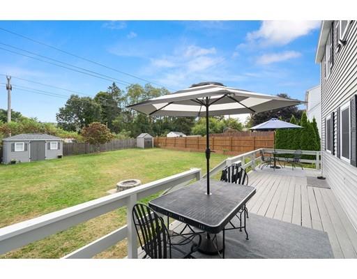 48 Rainbow Drive Haverhill, MA 01835 - Photo 32 of 33 a view of backyard with seating space and trees