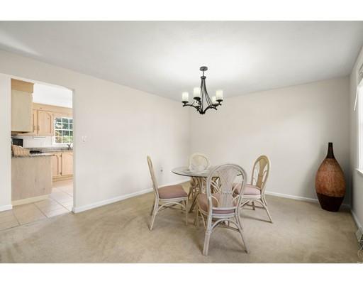 48 Rainbow Drive Haverhill, MA 01835 - Photo 8 of 33 a view of a dining room with furniture and wooden floor