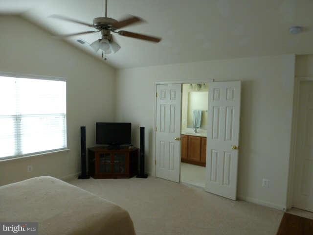 81 Glenbrook Road Ranson, WV 25438 - Photo 18 of 30 a living room with furniture and a flat screen tv