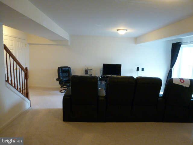 81 Glenbrook Road Ranson, WV 25438 - Photo 21 of 30 a living room with furniture