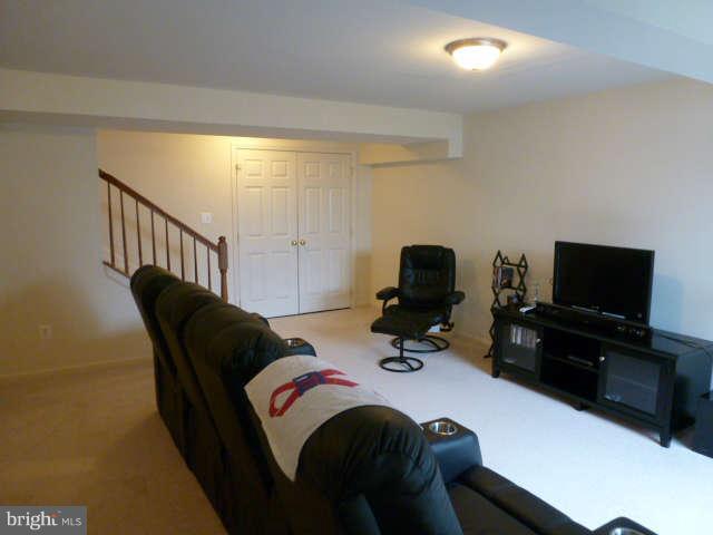 81 Glenbrook Road Ranson, WV 25438 - Photo 22 of 30 a bedroom with a bed and a television