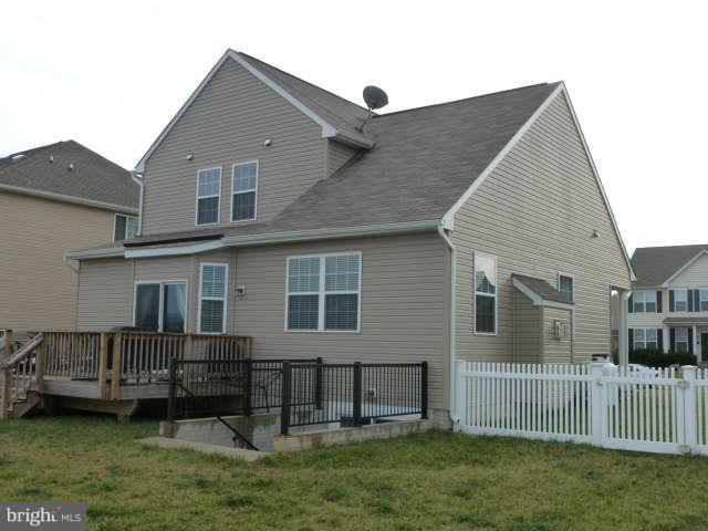 81 Glenbrook Road Ranson, WV 25438 - Photo 29 of 30 a front view of a house with a garden