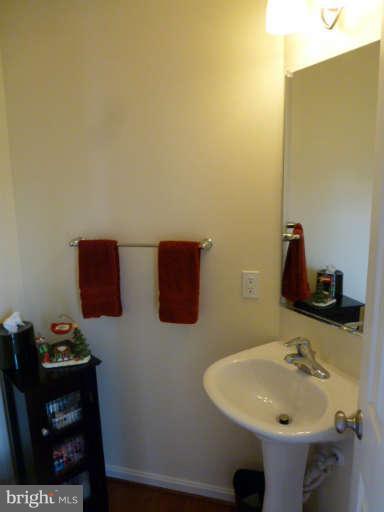 81 Glenbrook Road Ranson, WV 25438 - Photo 5 of 30 a bathroom with a sink and a mirror