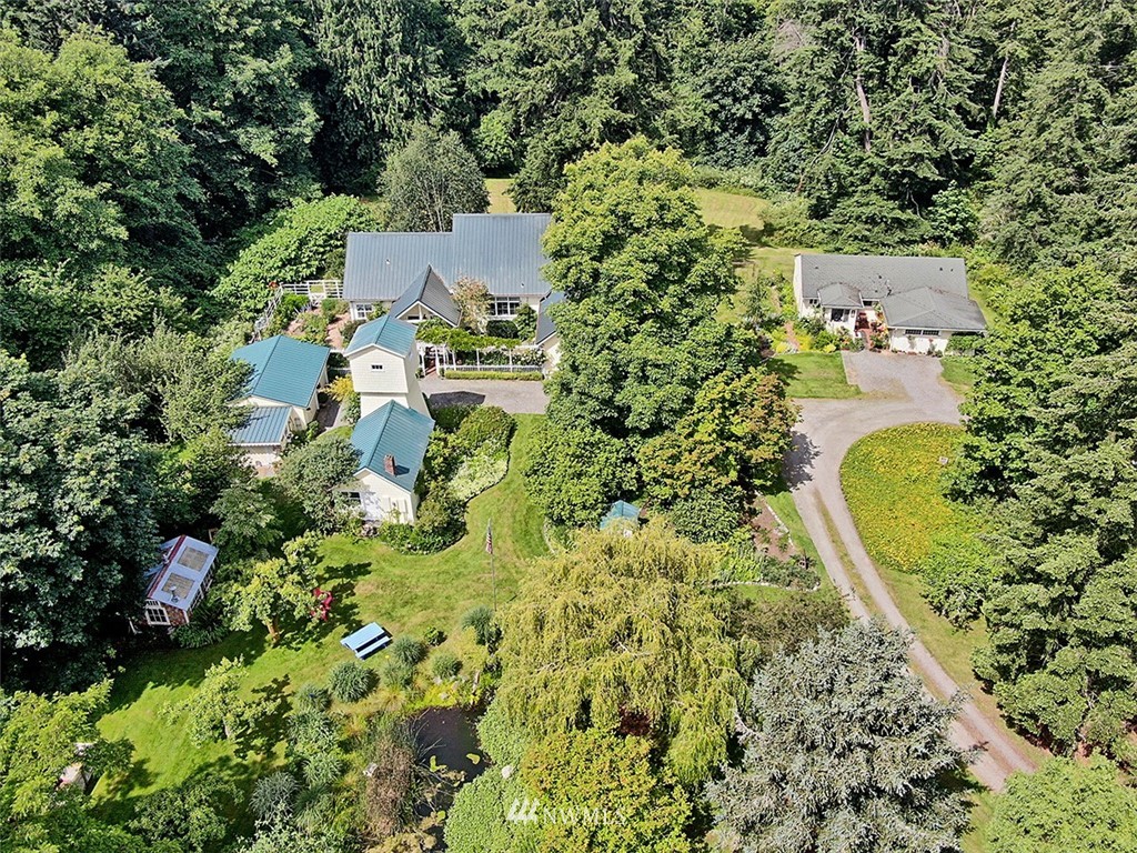1618 & 1616 Lancaster Road Freeland, WA 98249 - Photo 2 of 40 an aerial view of residential house with outdoor space and trees all around