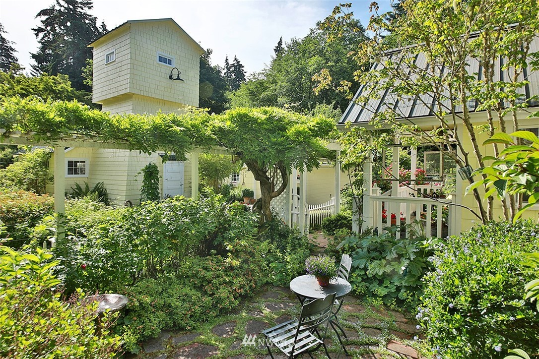 1618 & 1616 Lancaster Road Freeland, WA 98249 - Photo 18 of 40 a view of a house with a yard and plants