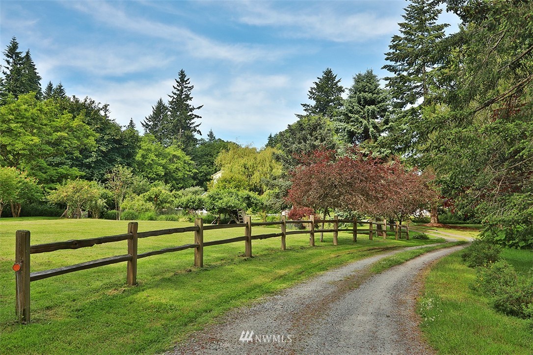 1618 & 1616 Lancaster Road Freeland, WA 98249 - Photo 3 of 40 a view of park with wooden fence