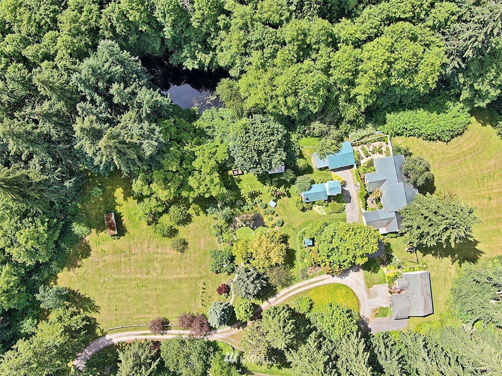 1618 & 1616 Lancaster Road Freeland, WA 98249 - Photo 40 of 40 an aerial view of residential house with outdoor space and trees all around