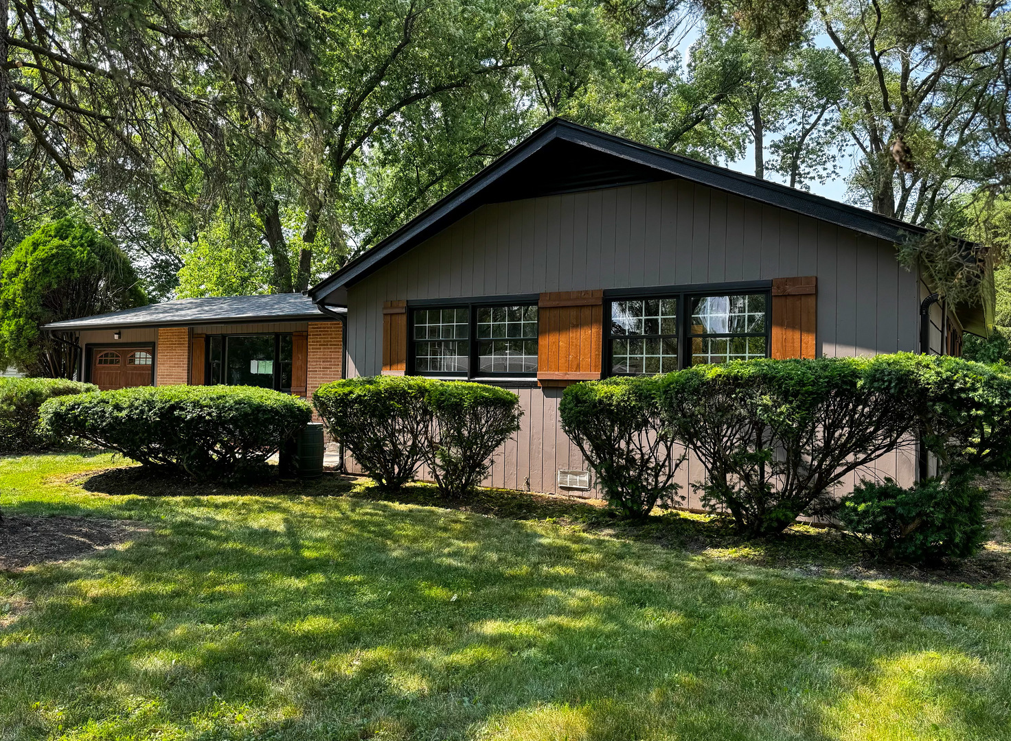 3302 St James Street Rolling Meadows, IL 60008 - Photo 1 of 20 a front view of house with yard and green space