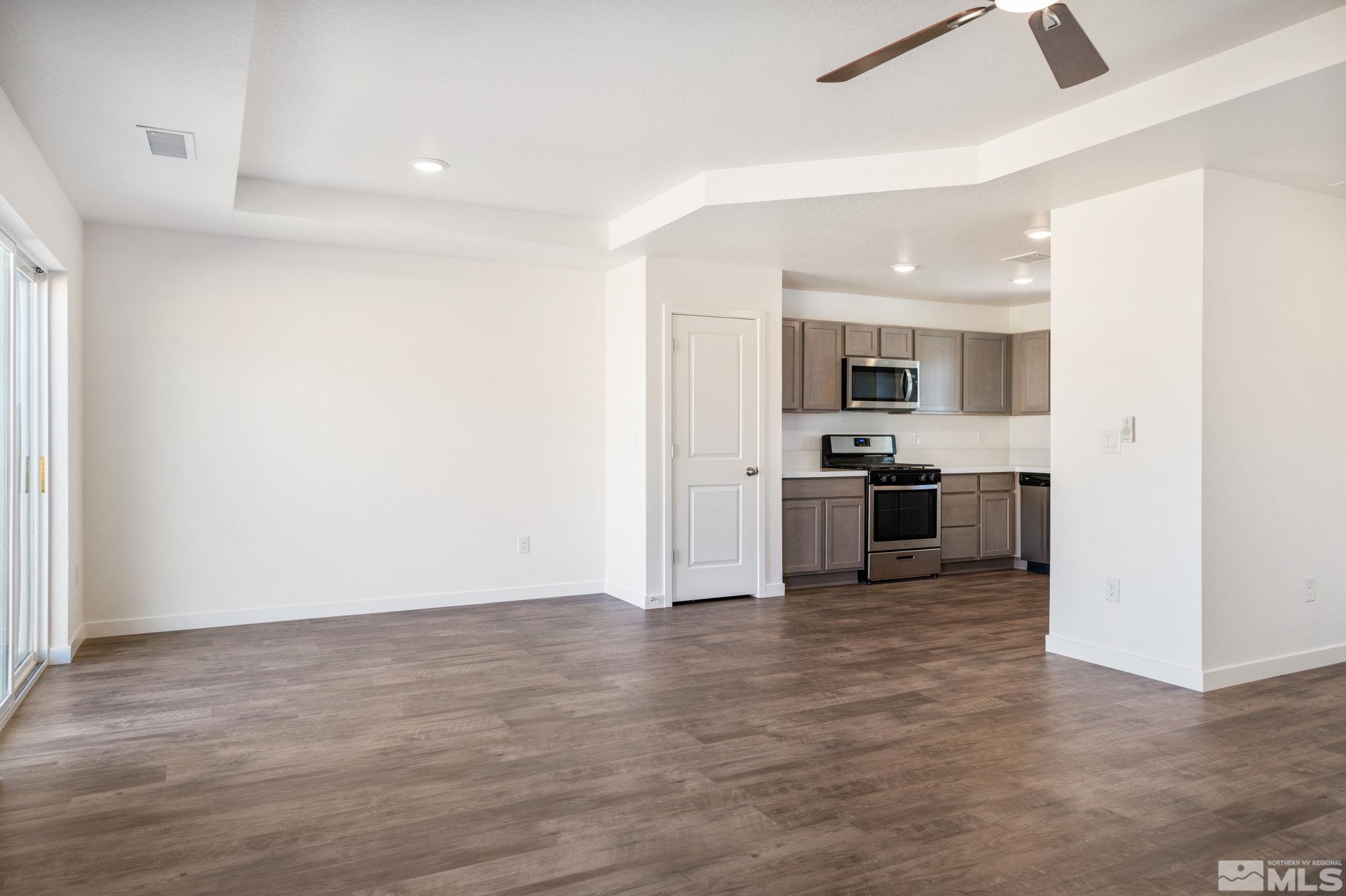 211 Green Lane Dayton, NV 89403 - Photo 11 of 28 a view of kitchen with microwave and cabinets