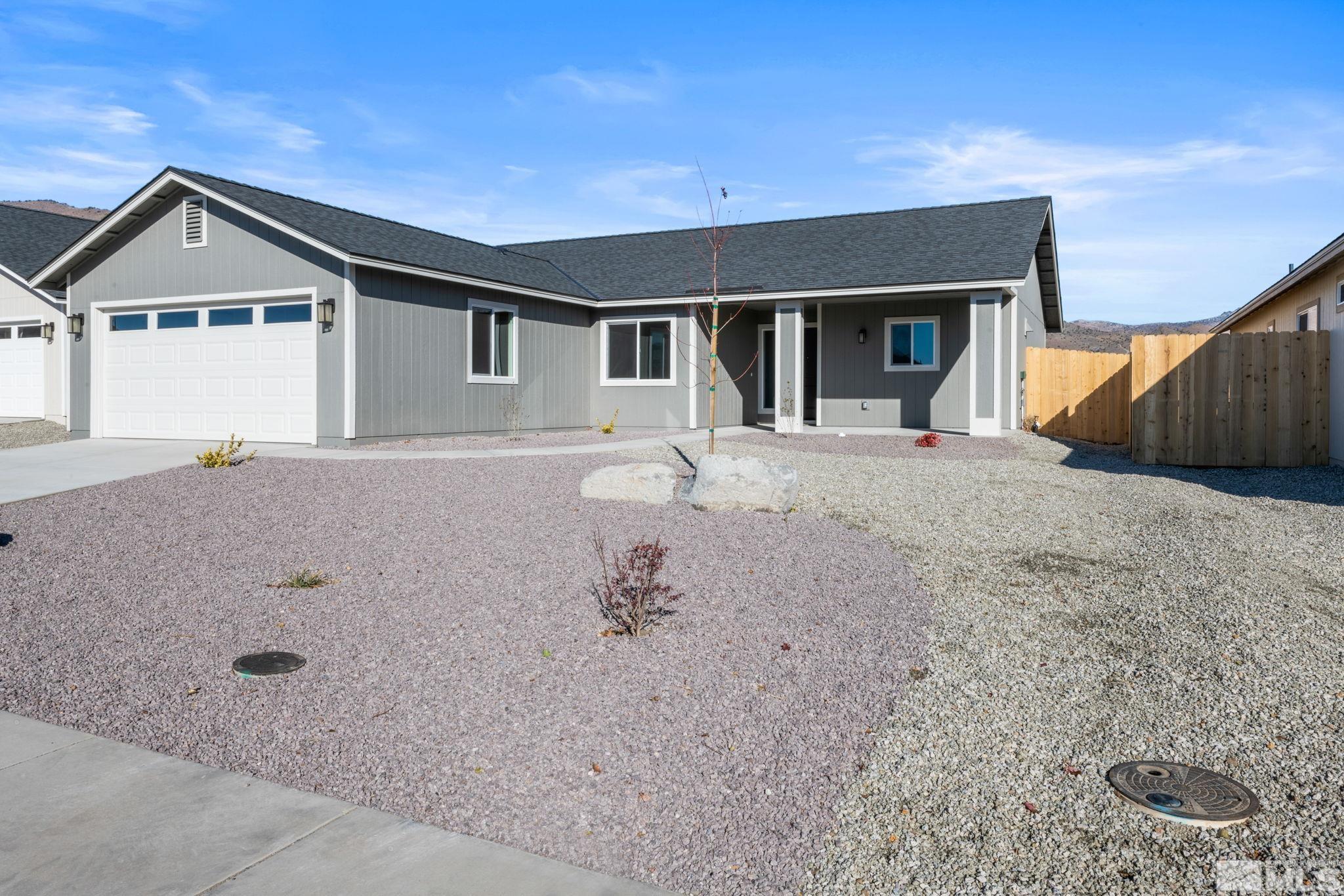 211 Green Lane Dayton, NV 89403 - Photo 2 of 28 a view of a house with backyard space