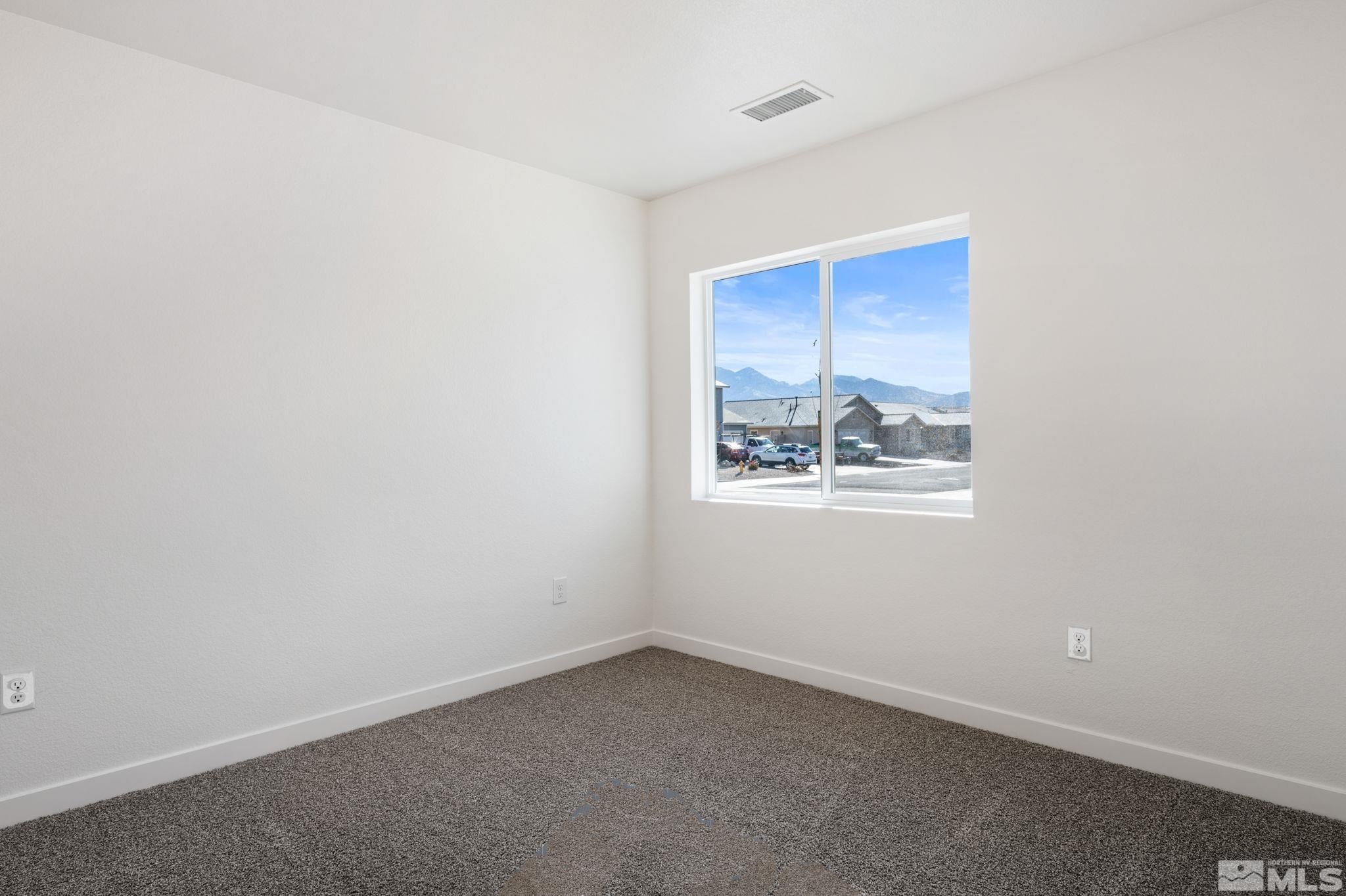 211 Green Lane Dayton, NV 89403 - Photo 21 of 28 an empty room with a window