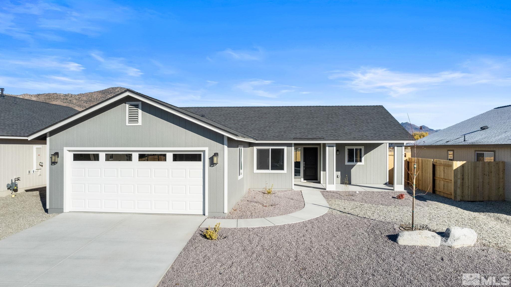 211 Green Lane Dayton, NV 89403 - Photo 27 of 28 a front view of a house with a yard